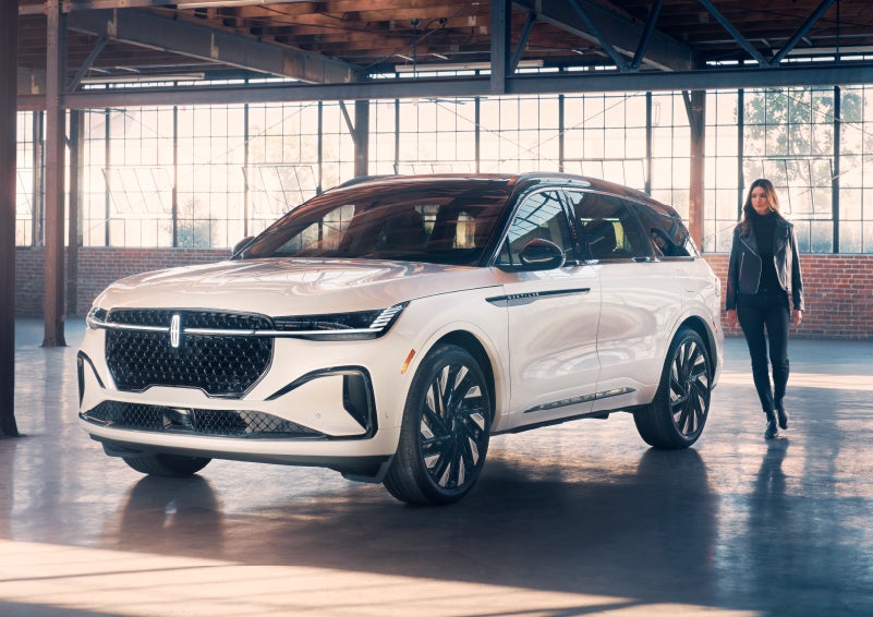 A person approaches a 2024 Lincoln Nautilus® SUV. | Greenwood Lincoln in Bowling Green KY