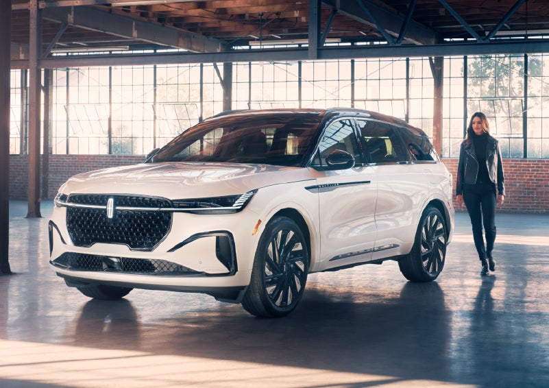 A person approaches a 2025 Lincoln Nautilus® SUV. | Greenwood Lincoln in Bowling Green KY
