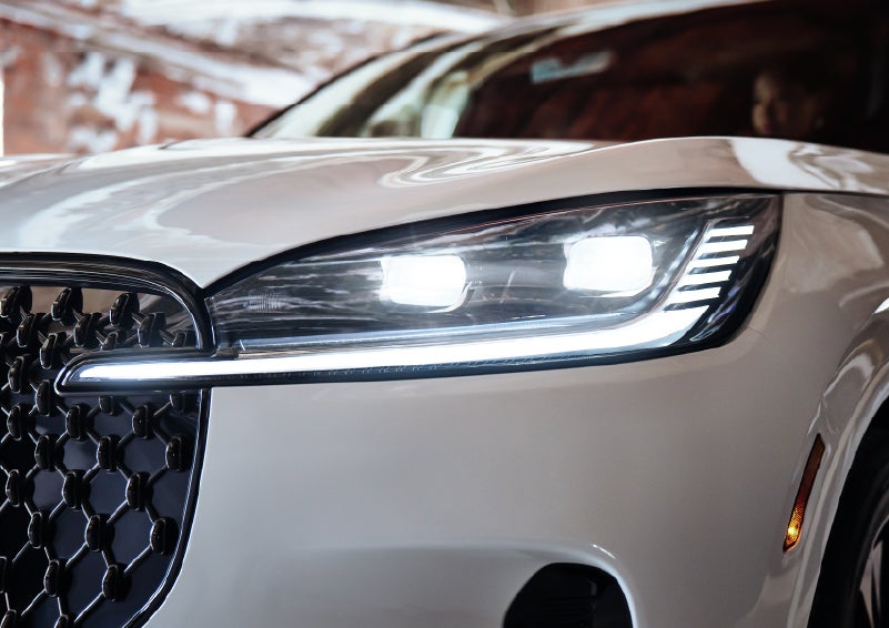 A close-up of a headlamp on the 2026 Lincoln Aviator® SUV is shown. | Greenwood Lincoln in Bowling Green KY