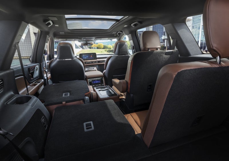One side of the PowerFold® third-row seat and a second-row seat are folded forward in the 2026 Lincoln Aviator® SUV. | Greenwood Lincoln in Bowling Green KY