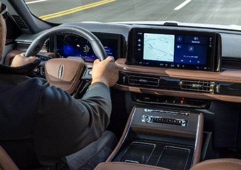 A person is driving a 2026 Lincoln Aviator® SUV as seen from inside the cabin. | Greenwood Lincoln in Bowling Green KY