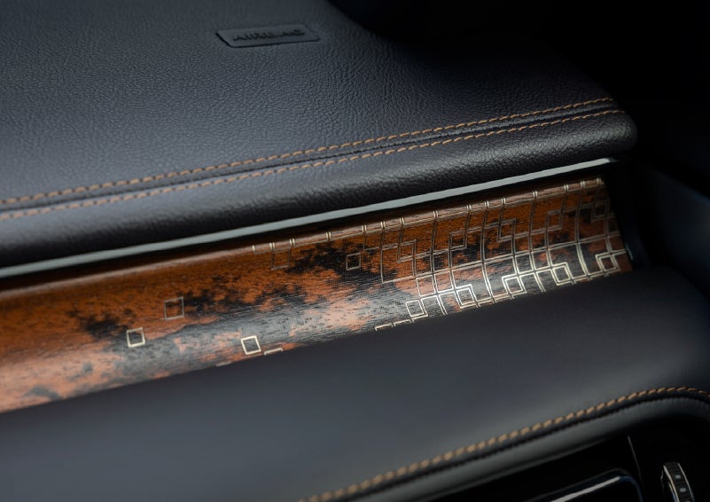 A close-up shot of the 2026 Lincoln Aviator® dashboard with unique black and brown accents and brown stitching. | Greenwood Lincoln in Bowling Green KY